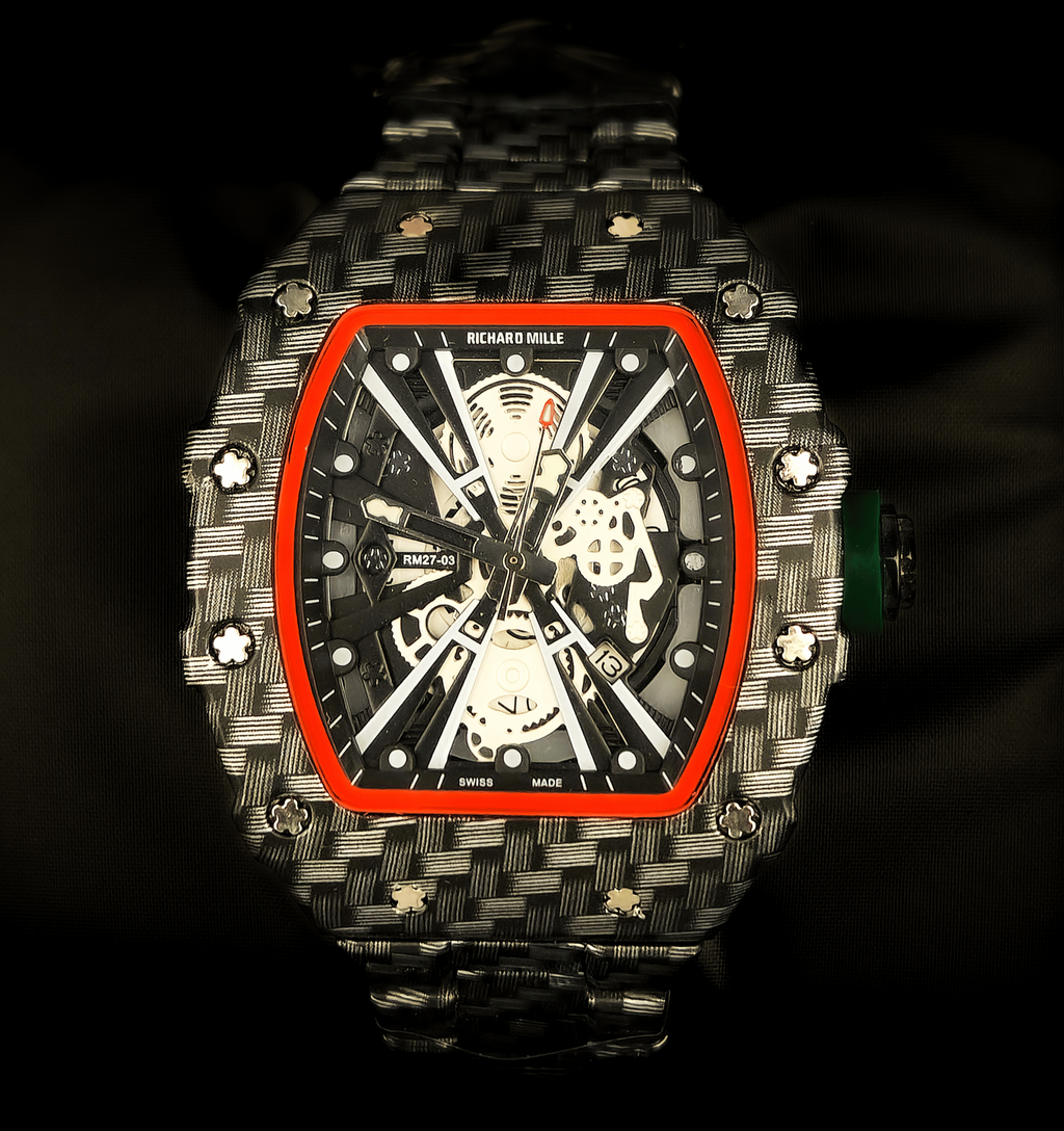 Luxury watch with a carbon fiber design on a dark background